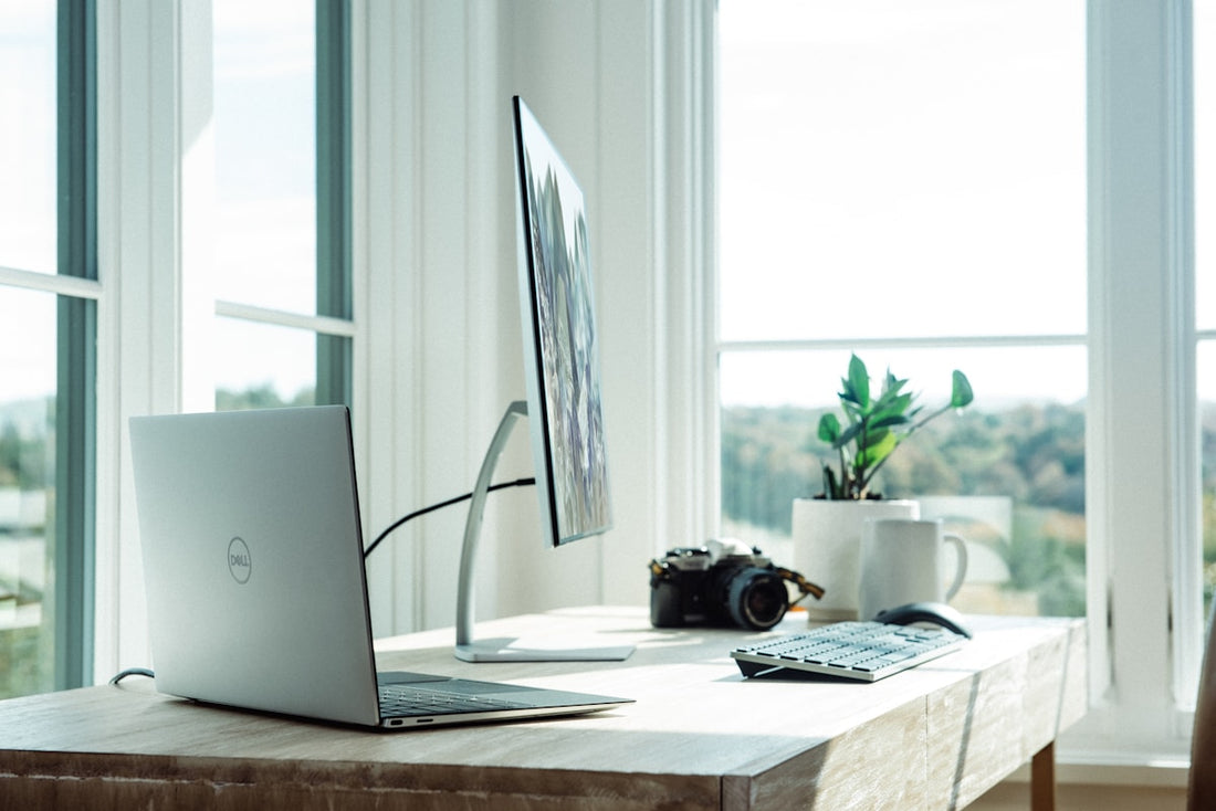 Clean home office desk setup with monitor stand